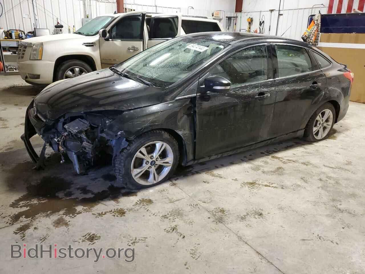 Фотография 1FADP3F28EL199950 - FORD FOCUS 2014