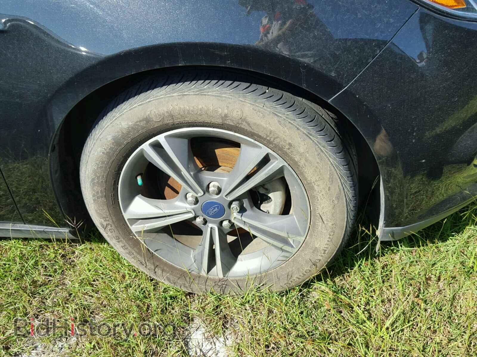 2014 FORD FOCUS - VIN: 1FADP3F2XEL340534 - Photo 4