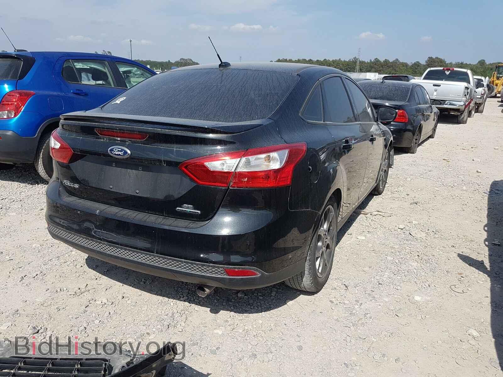 2014 FORD FOCUS - VIN: 1FADP3F21EL231279 - Photo 4