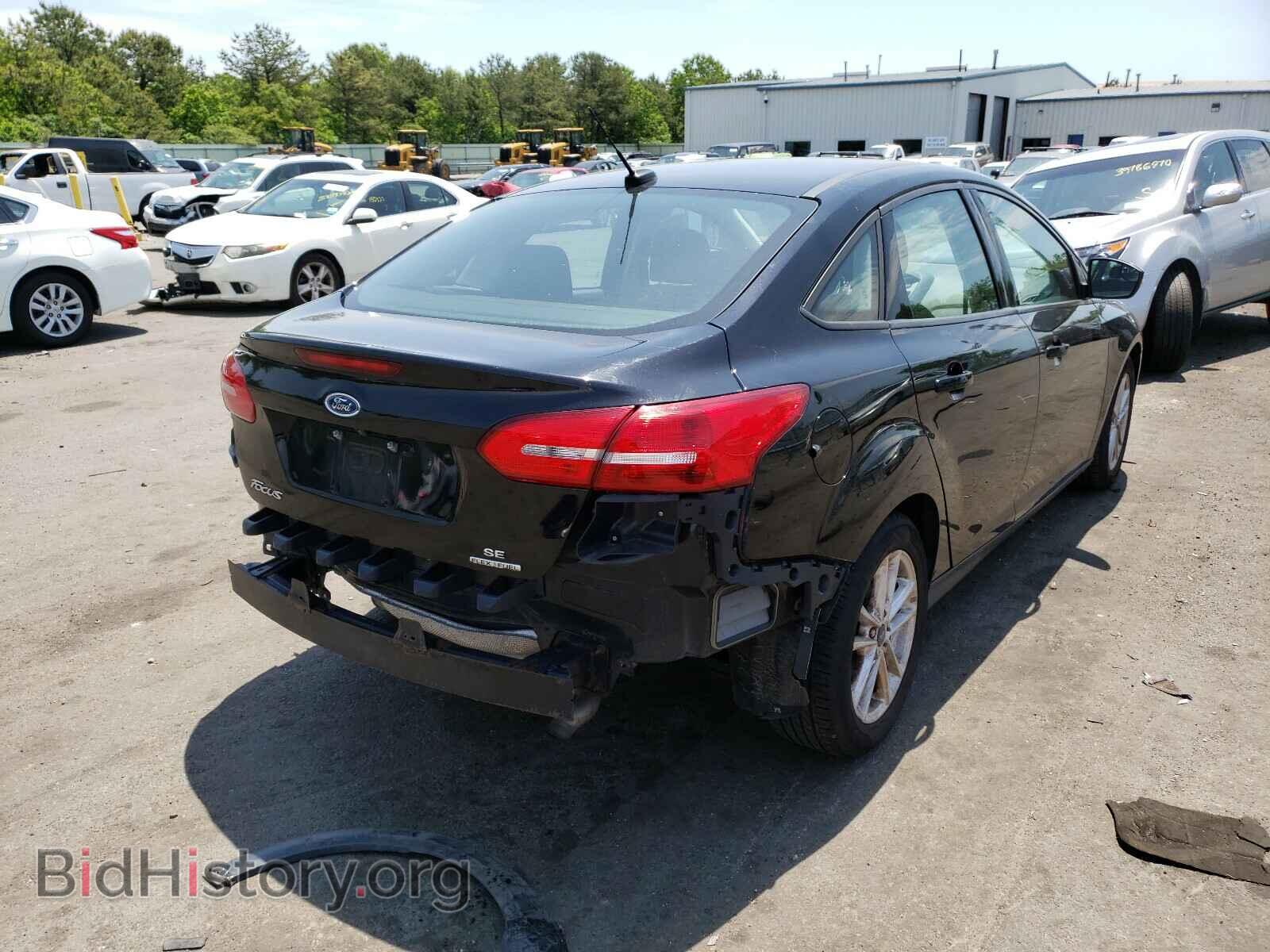 2016 FORD FOCUS - VIN: 1FADP3F24GL319651 - Photo 4