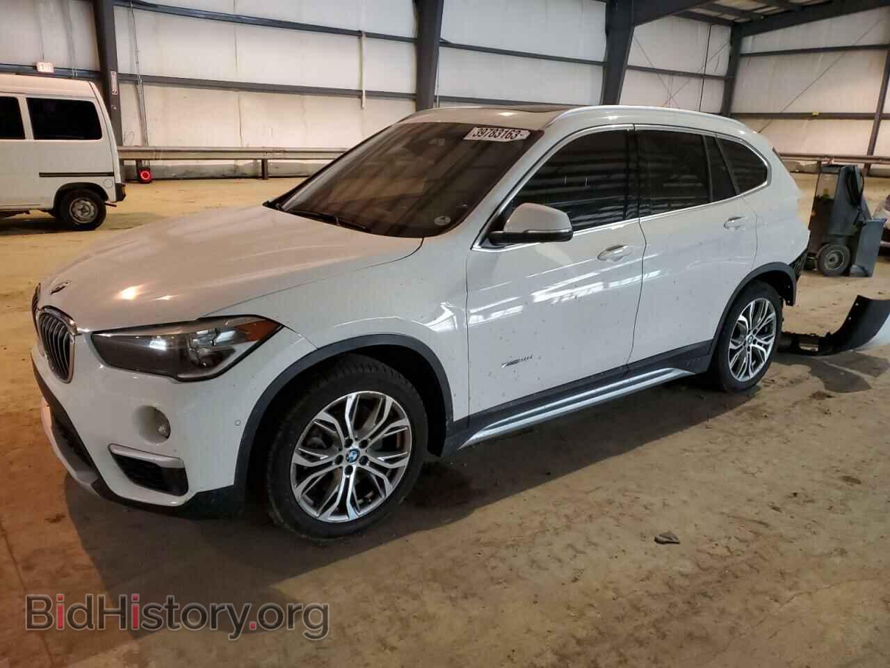 Фотография WBXHT3C39G5E54610 - BMW X1 2016