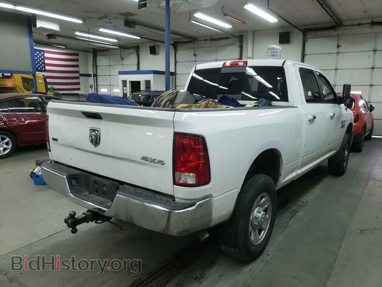 2016 RAM 2500 - VIN: 3C6TR5DT0GG166259 - Фото 4