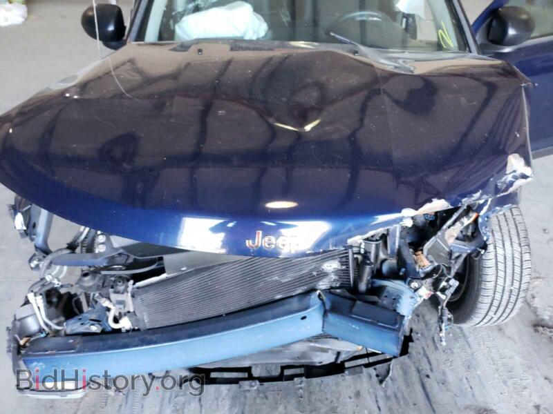 2012 Jeep COMPASS (VIN 1C4NJCEB5CD634125) — photo 7 of 10