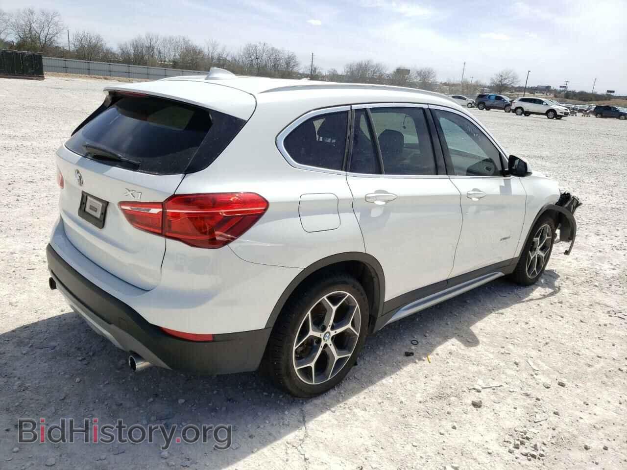 2018 BMW X1 - VIN: WBXHT3C35J5F92796 - Фото 4