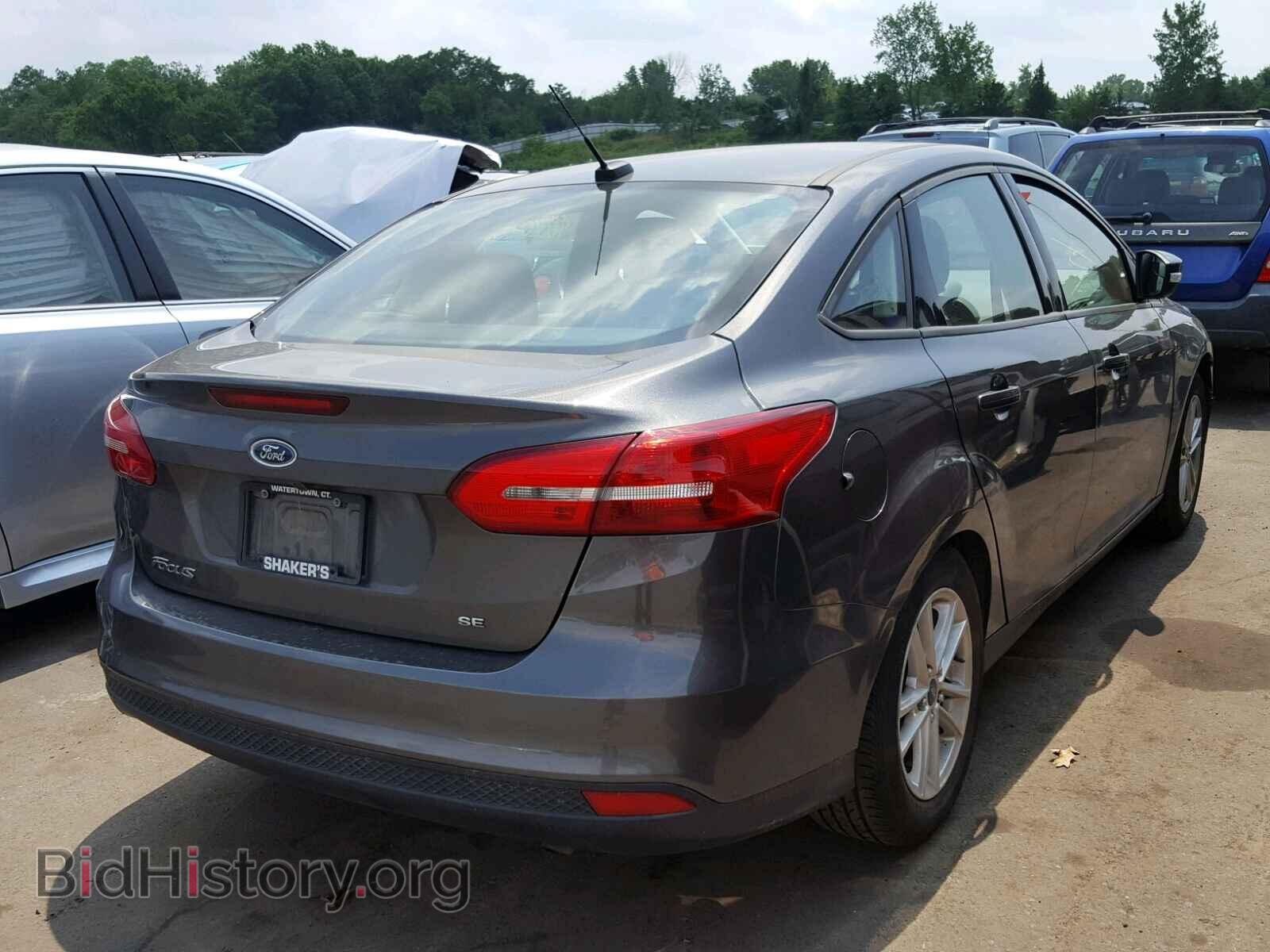2016 FORD FOCUS SE - VIN: 1FADP3F2XGL223569 - Фото 4