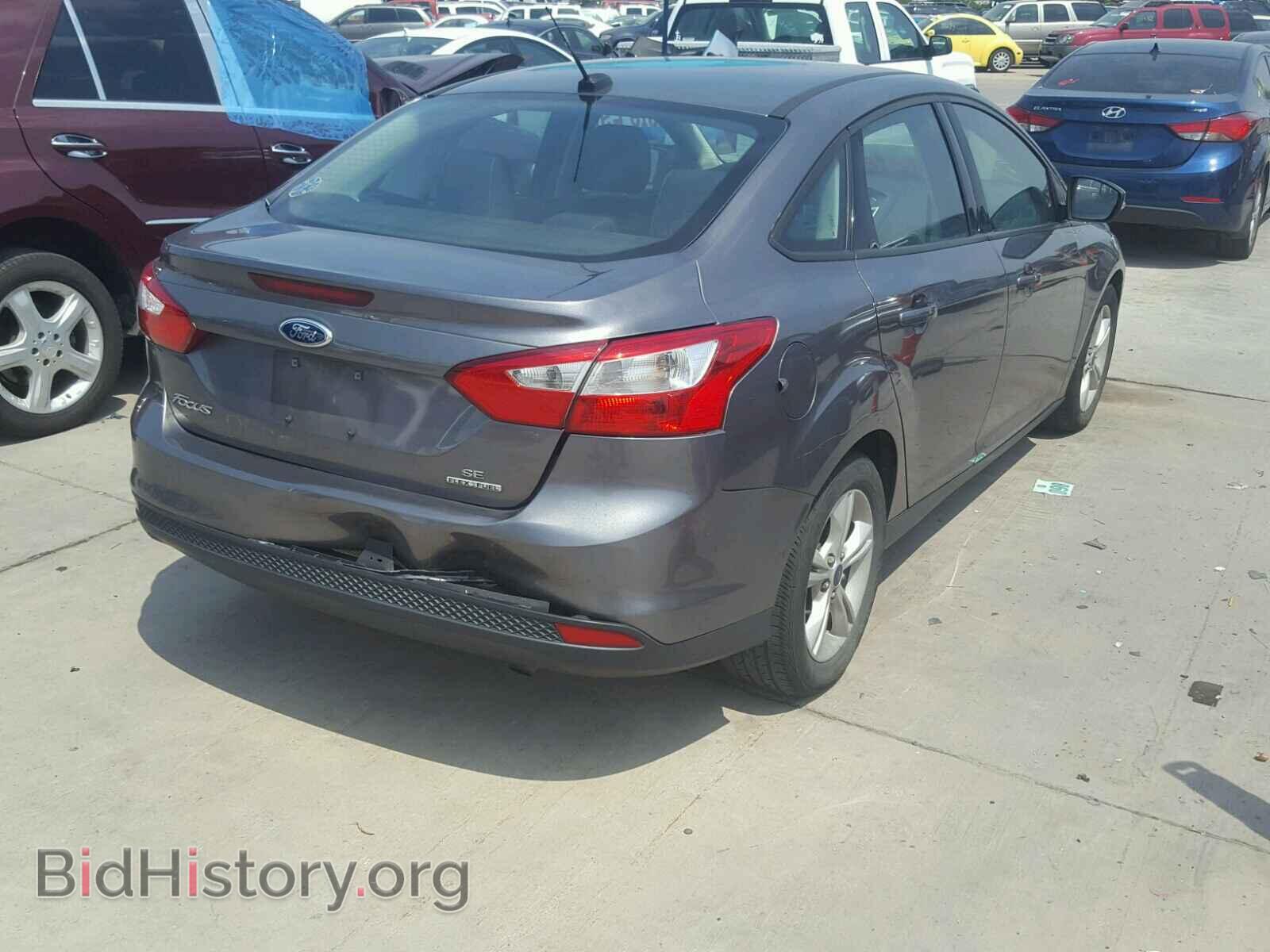 2014 FORD FOCUS - VIN: 1FADP3F21EL412639 - Photo 4
