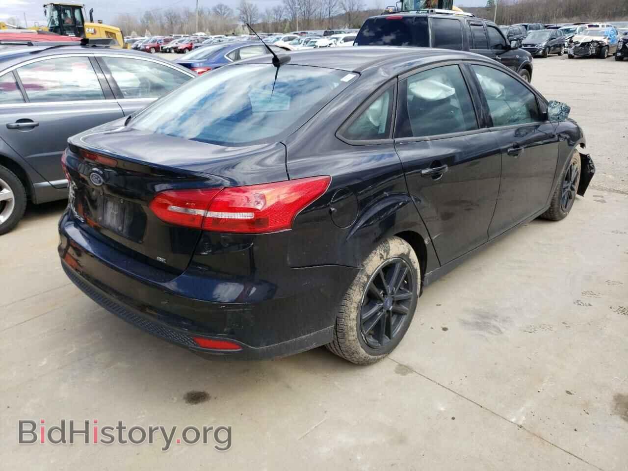 2016 FORD FOCUS - VIN: 1FADP3F22GL393120 - Photo 4