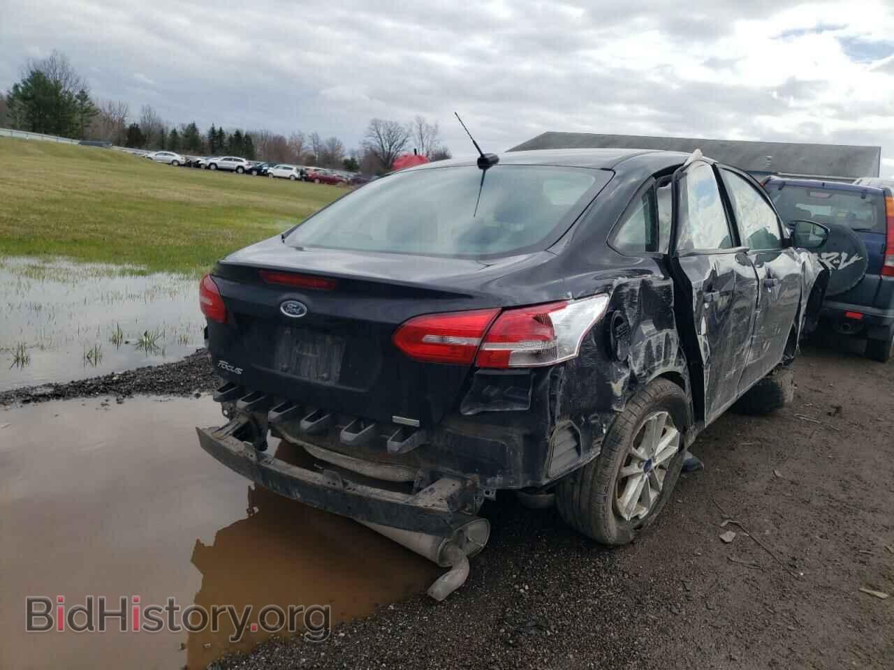 2018 FORD FOCUS - VIN: 1FADP3FE0JL209908 - Photo 4