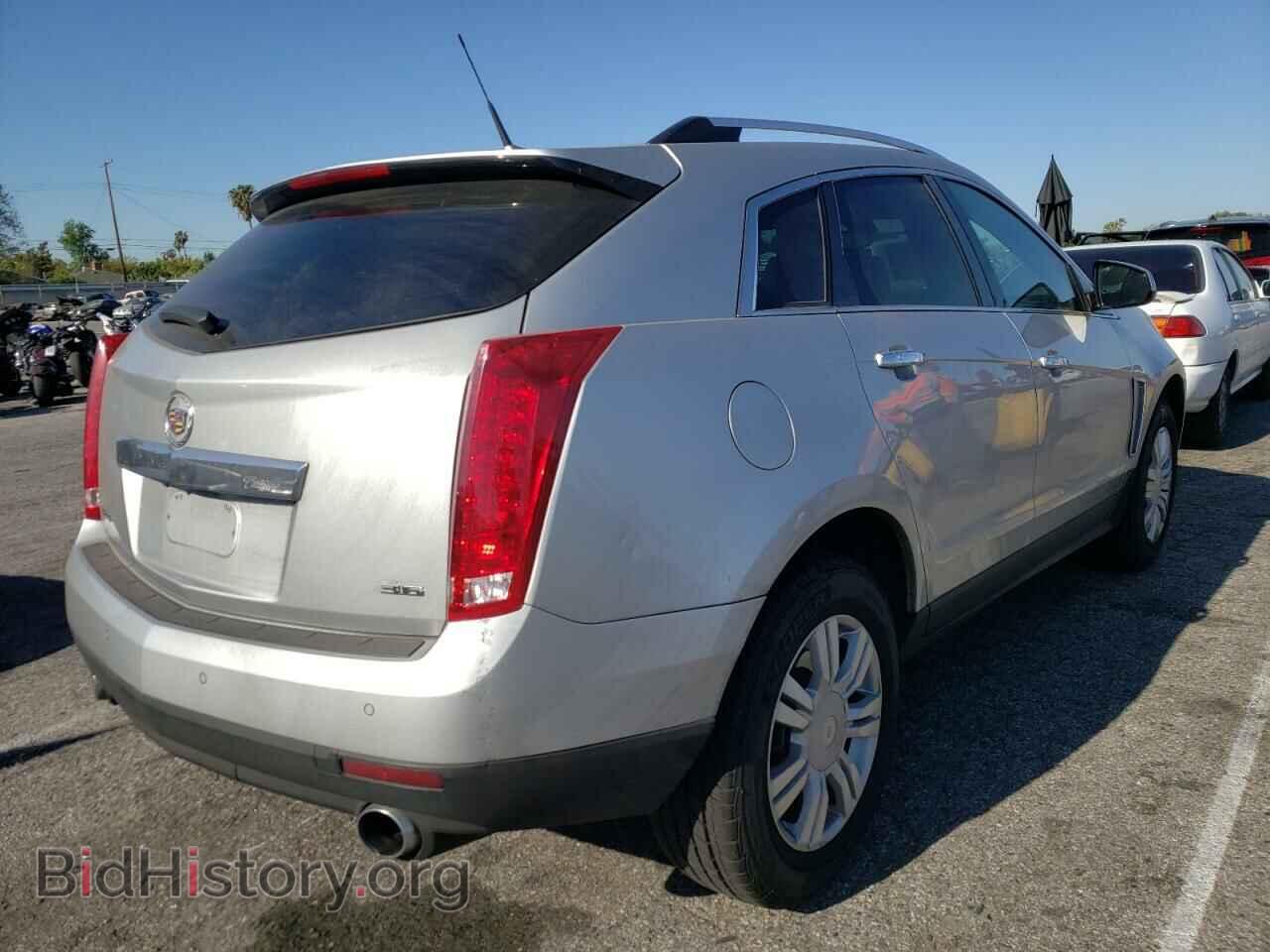2014 CADILLAC SRX - VIN: 3GYFNBE32ES628663 - Фото 4