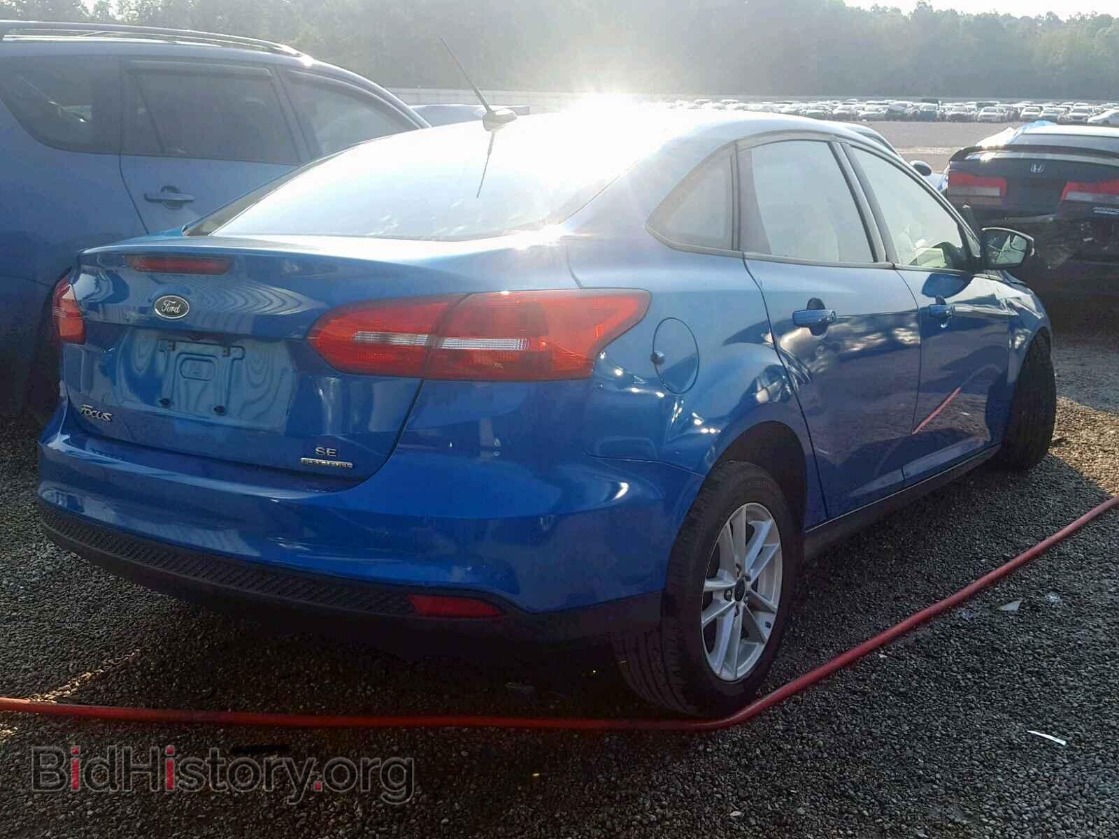 2016 FORD FOCUS SE - VIN: 1FADP3F2XGL319640 - Фото 4
