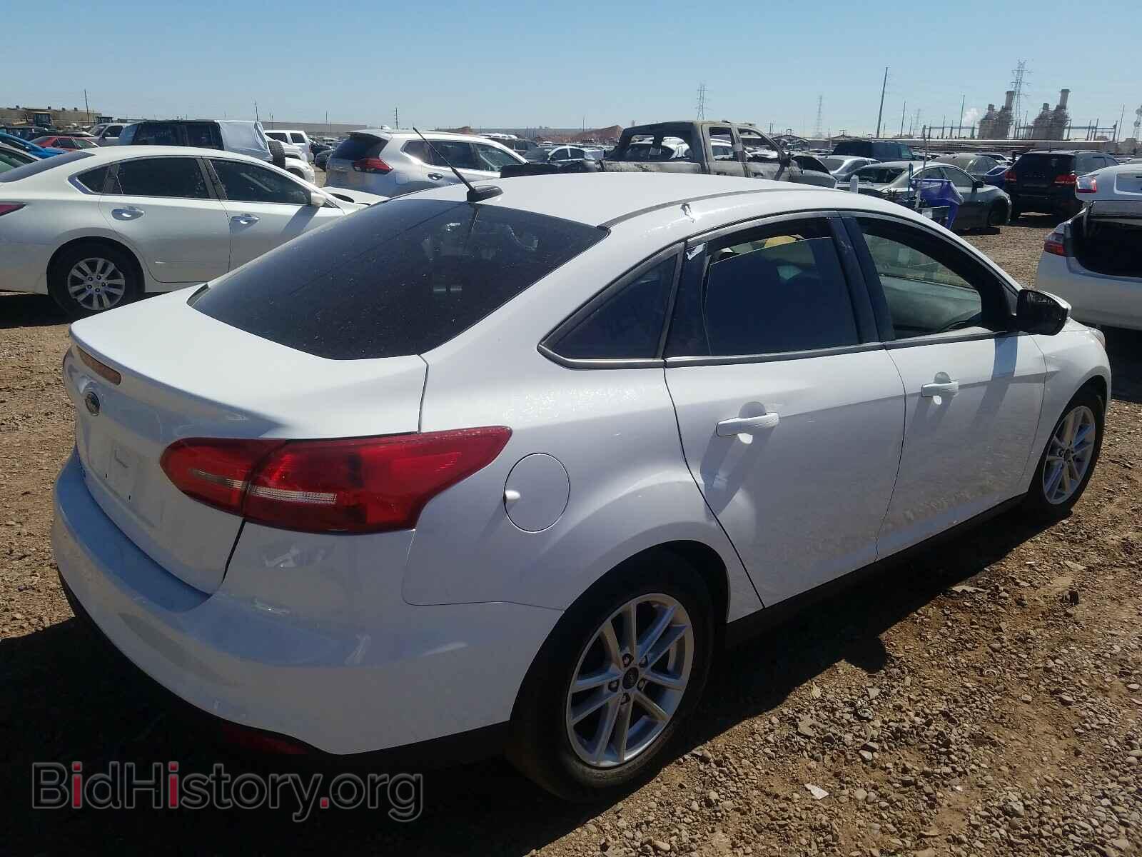 2017 FORD FOCUS - VIN: 1FADP3F22HL296176 - Photo 4