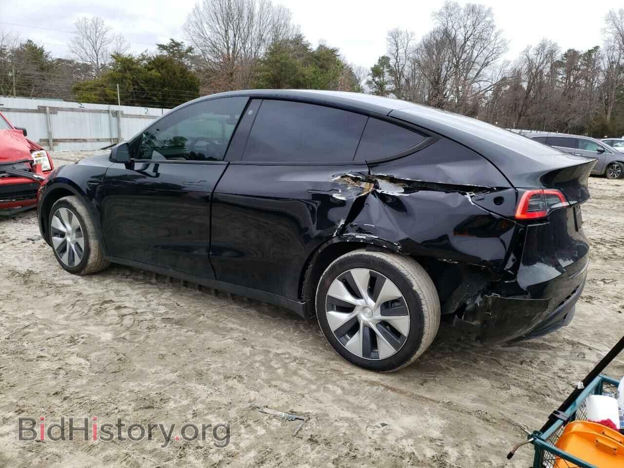 2023 TESLA MODEL Y - VIN: 7SAYGDEEXPF631041 - Фото 2