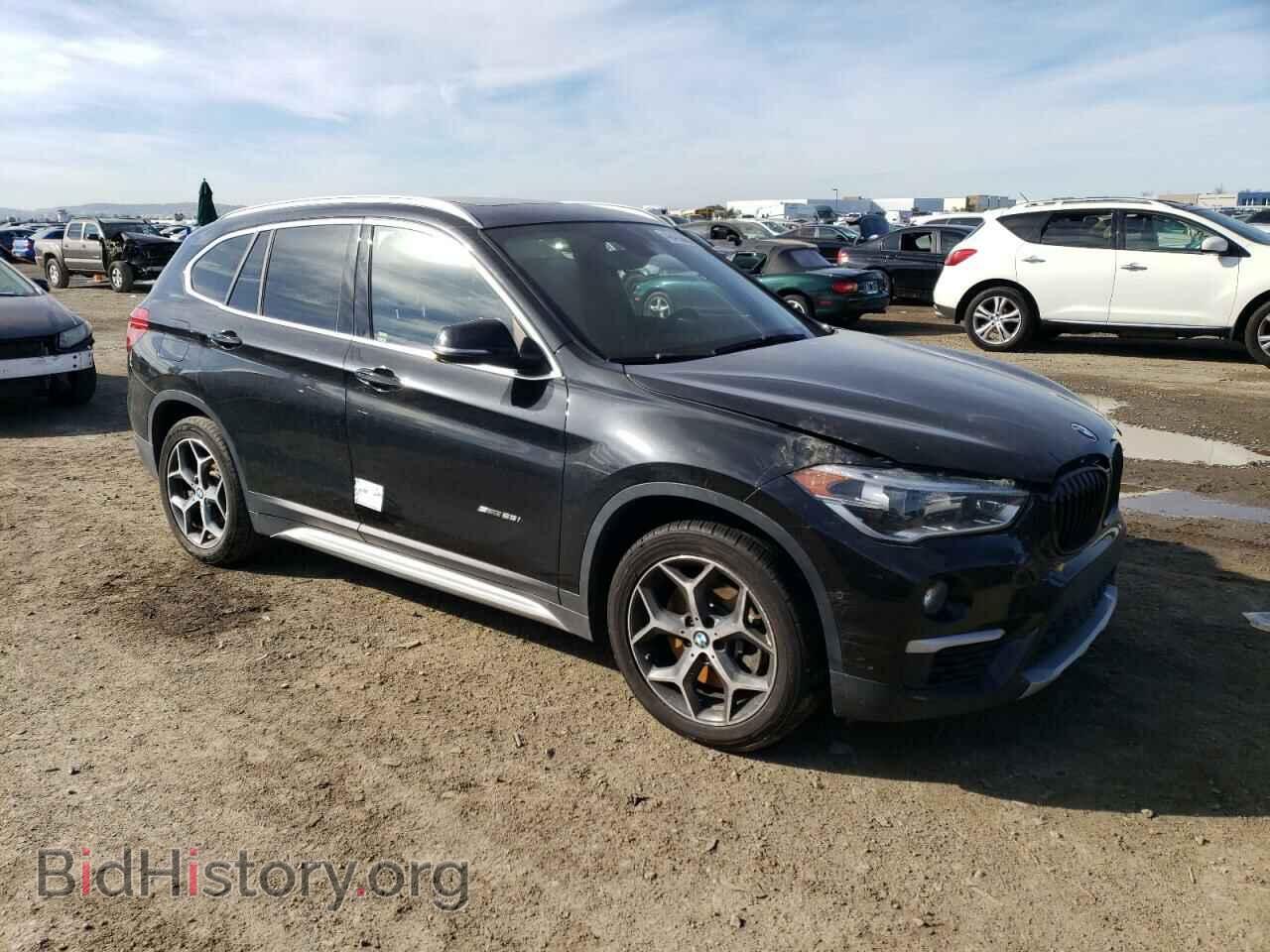2017 BMW X1 - VIN: WBXHU7C37H5H33270 - Фото 4