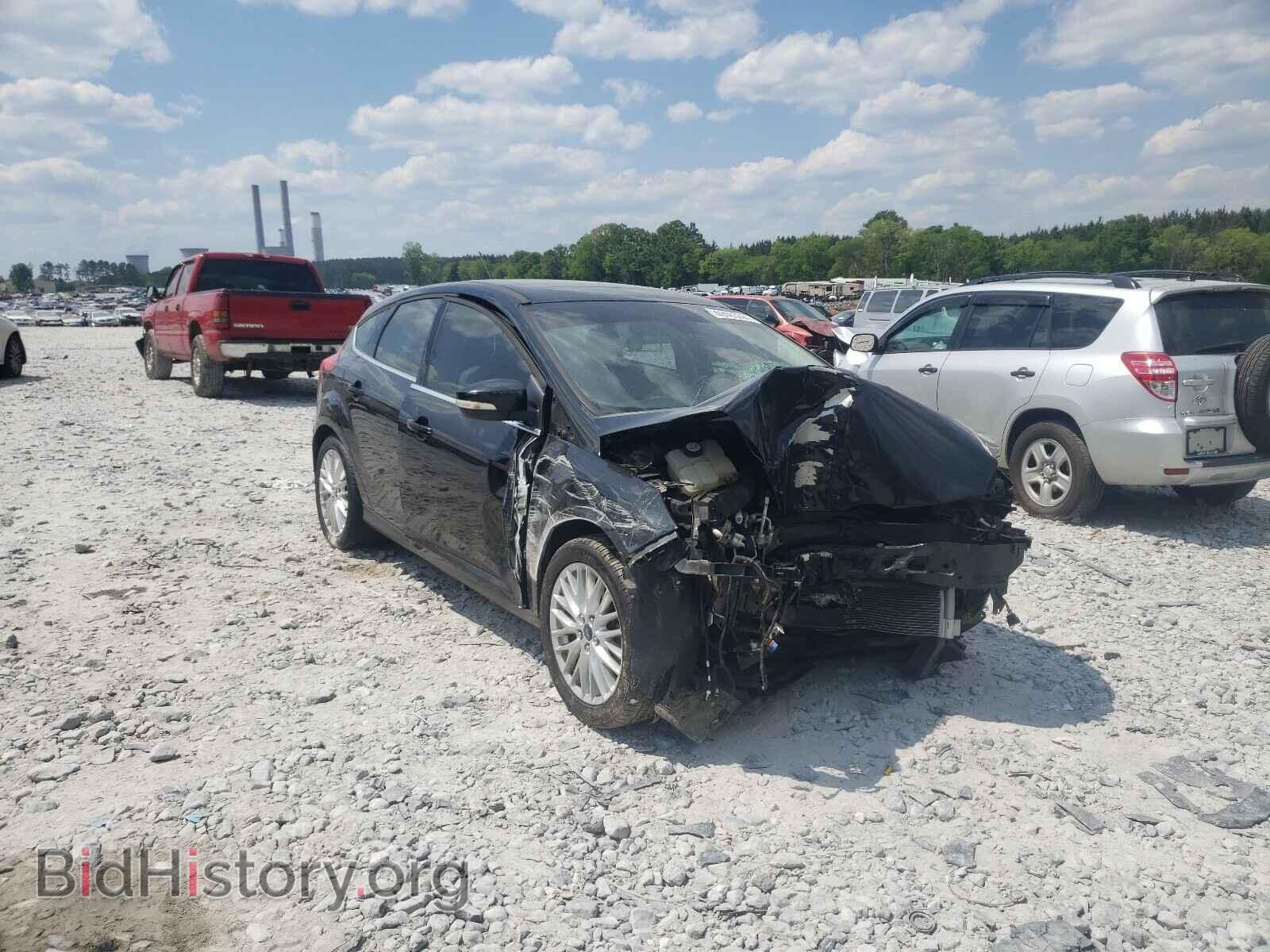 Фотография 1FAHP3M21CL352203 - FORD FOCUS 2012