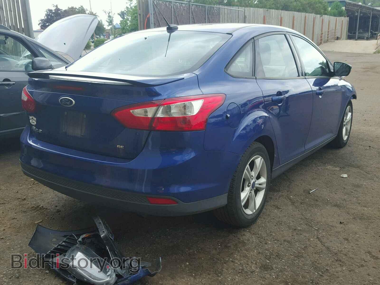2012 Ford FOCUS (VIN 1FAHP3F27CL354633) — photo 4 of 10