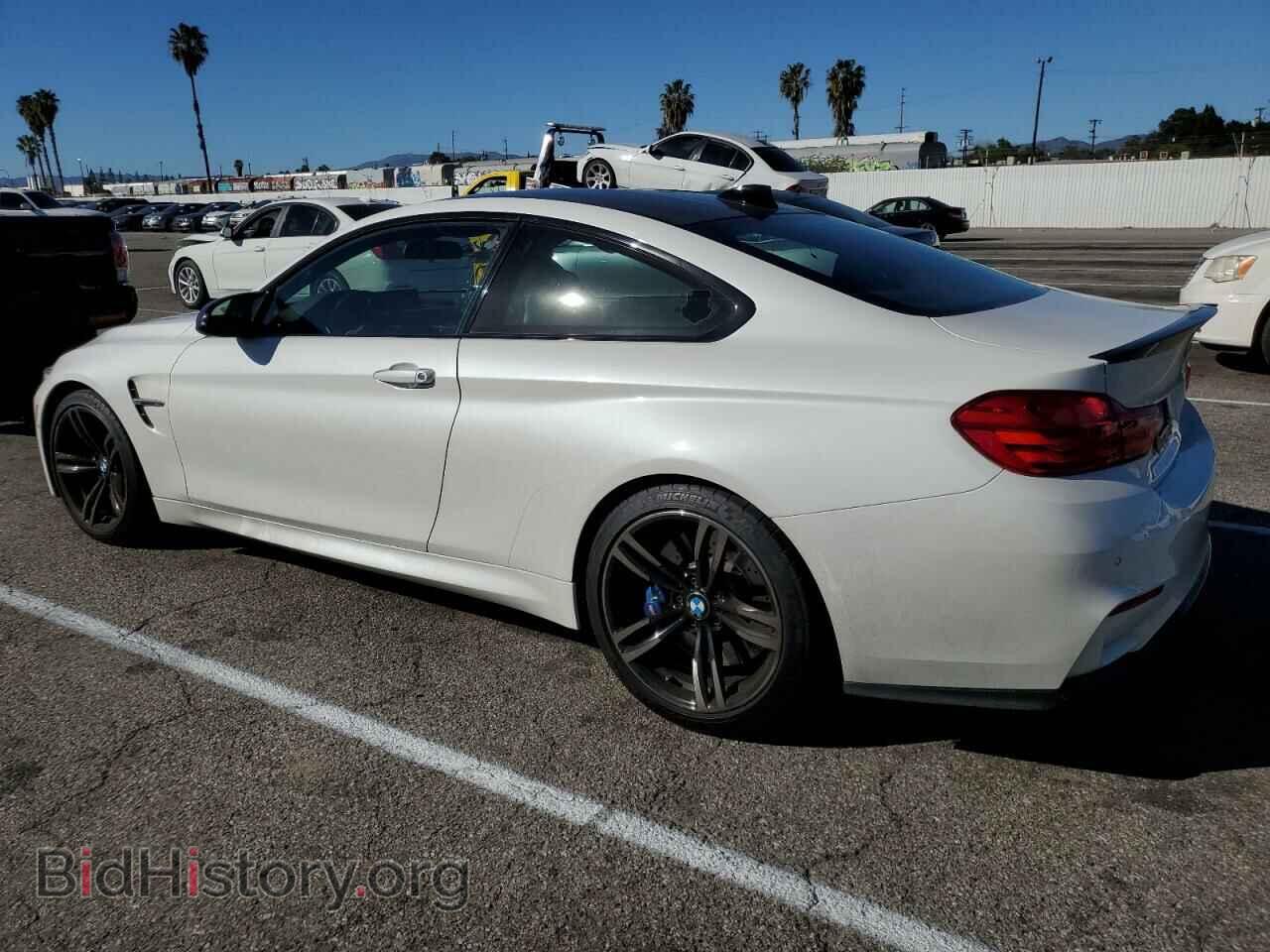 2015 BMW M4 - VIN: WBS3R9C55FK330561 - Фото 2