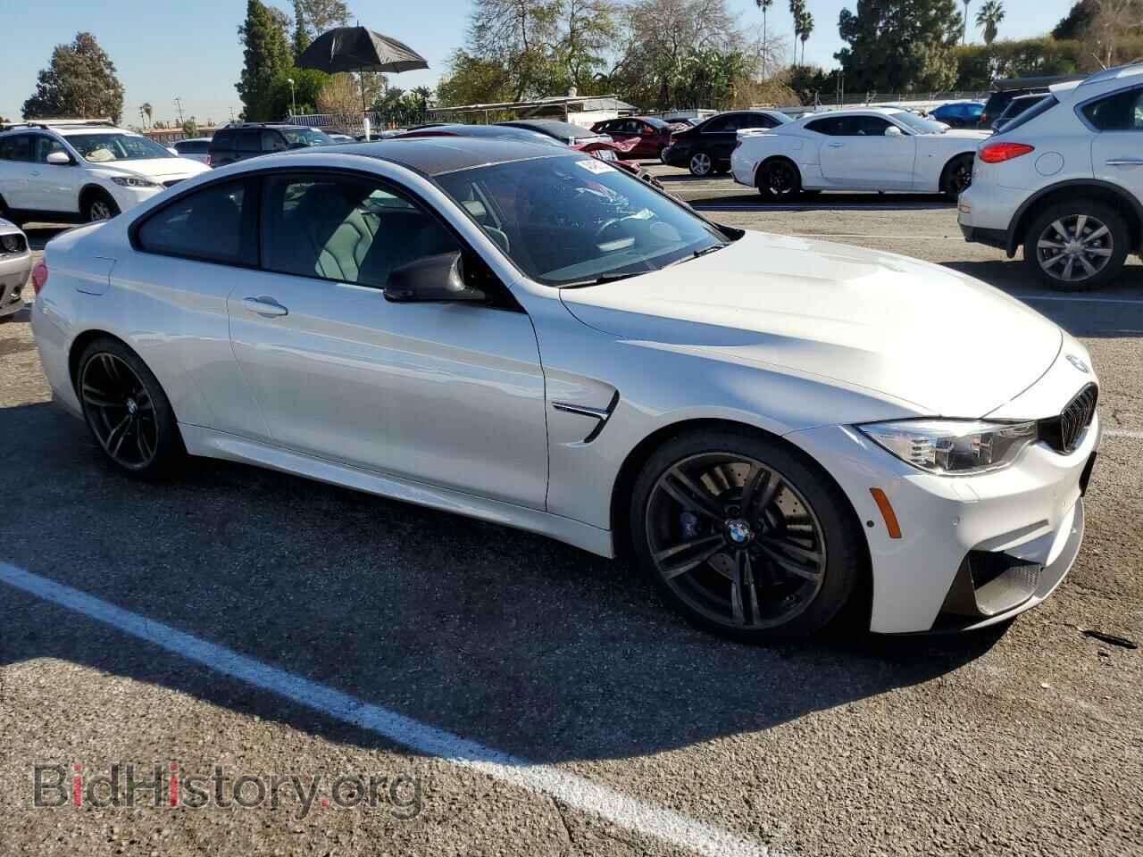 2015 BMW M4 - VIN: WBS3R9C55FK330561 - Фото 4