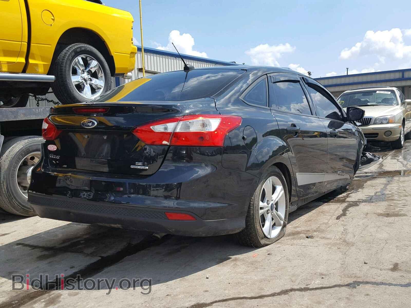 2014 FORD FOCUS - VIN: 1FADP3F22EL203880 - Photo 4