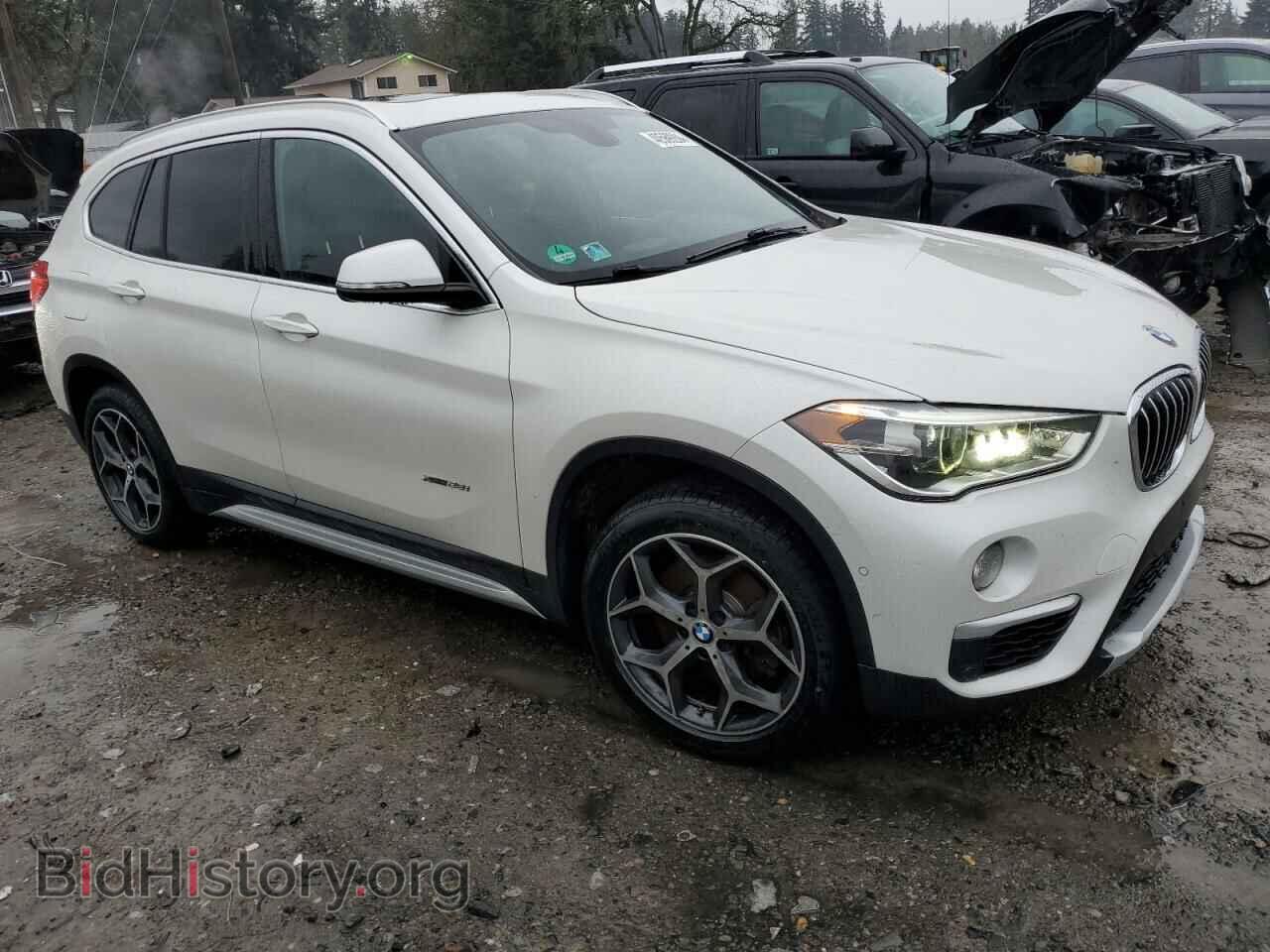 2017 BMW X1 - VIN: WBXHT3C32H5F87291 - Фото 4