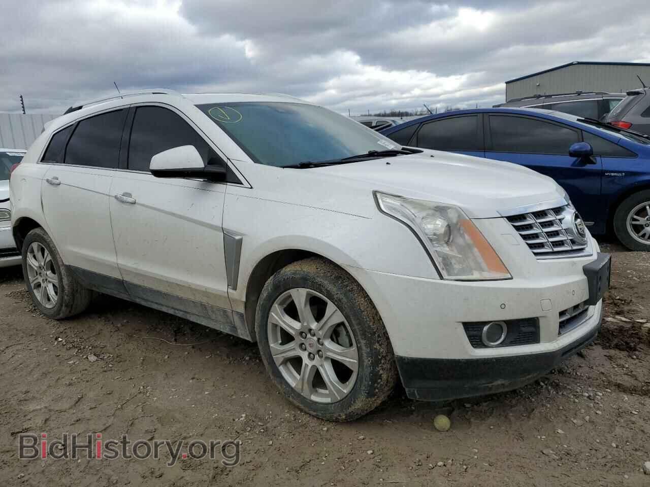 2014 CADILLAC SRX - VIN: 3GYFNDE30ES519629 - Фото 4