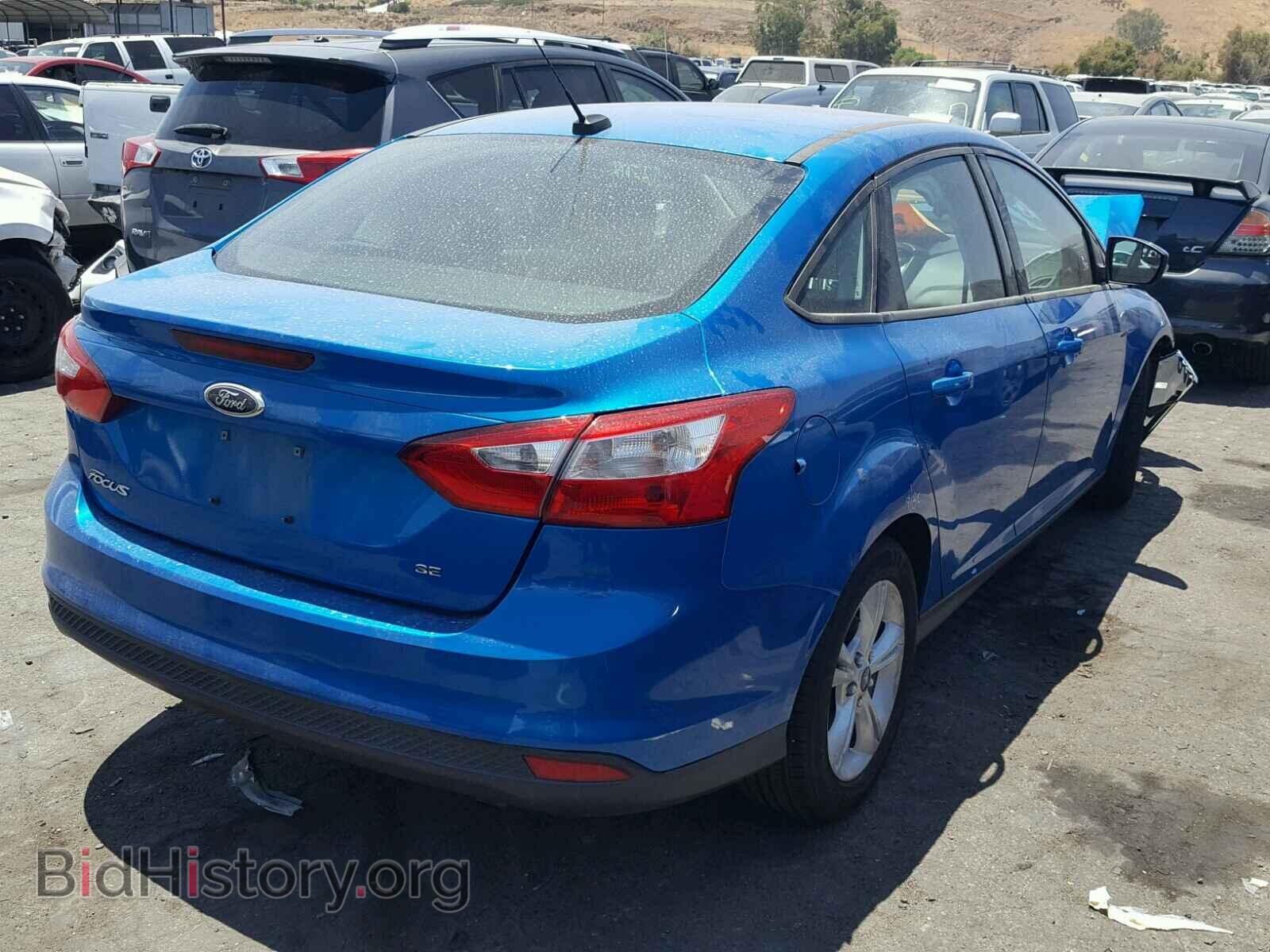 2014 FORD FOCUS - VIN: 1FADP3F21EL407800 - Photo 4