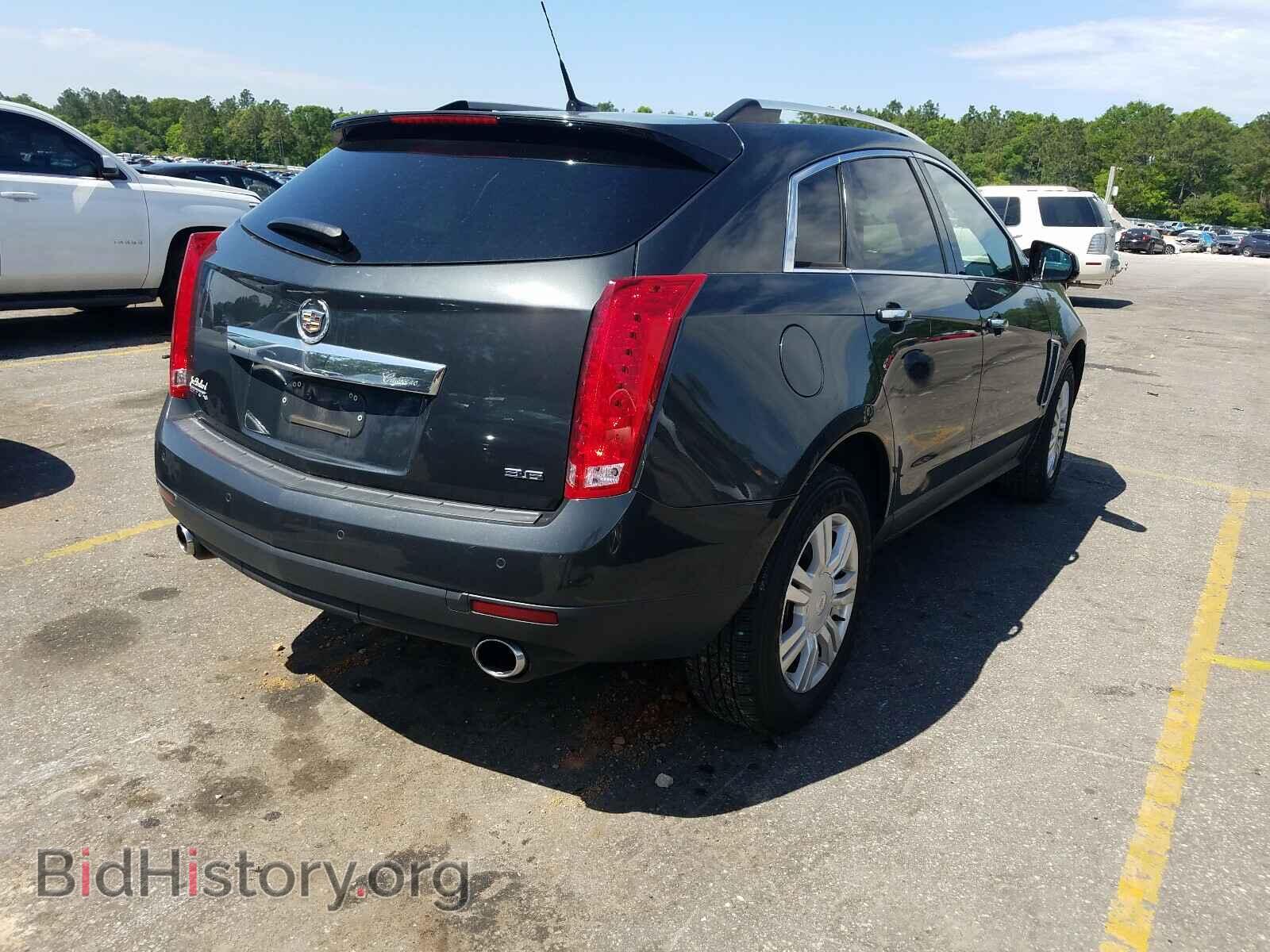2014 CADILLAC SRX - VIN: 3GYFNBE33ES578243 - Фото 4