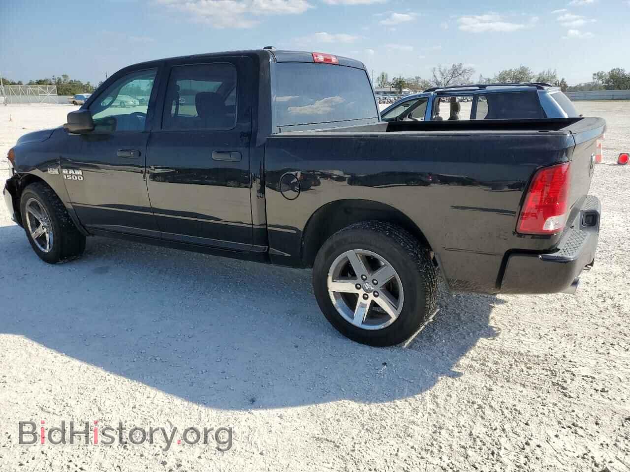 2014 RAM 1500 - VIN: 1C6RR6KT9ES170321 - Фото 2
