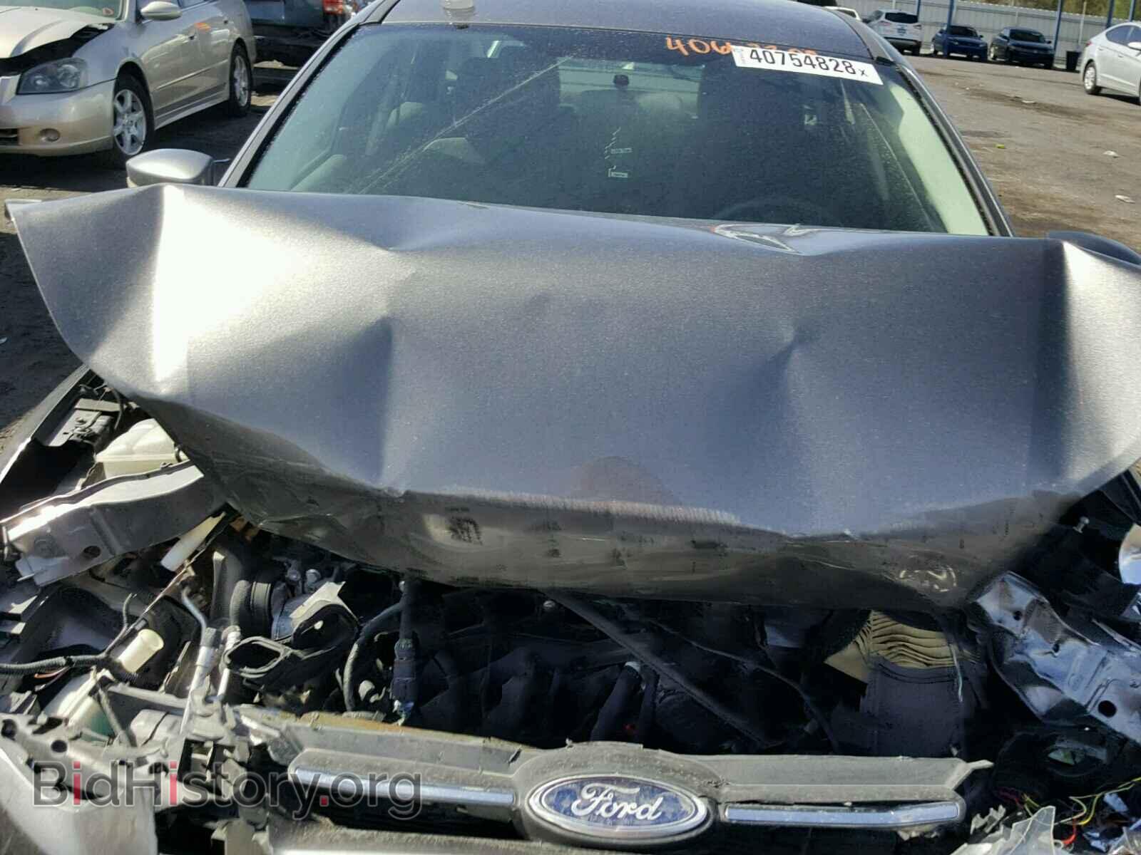 2014 FORD FOCUS - VIN: 1FADP3F24EL166105 - Фото 7