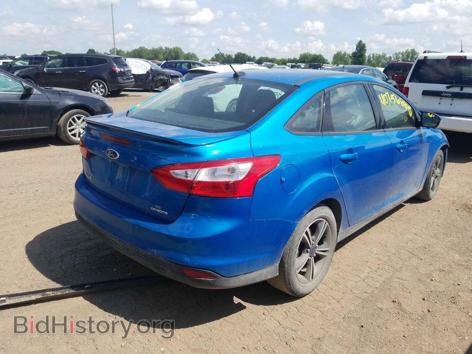 2014 FORD FOCUS - VIN: 1FADP3F2XEL299287 - Photo 4