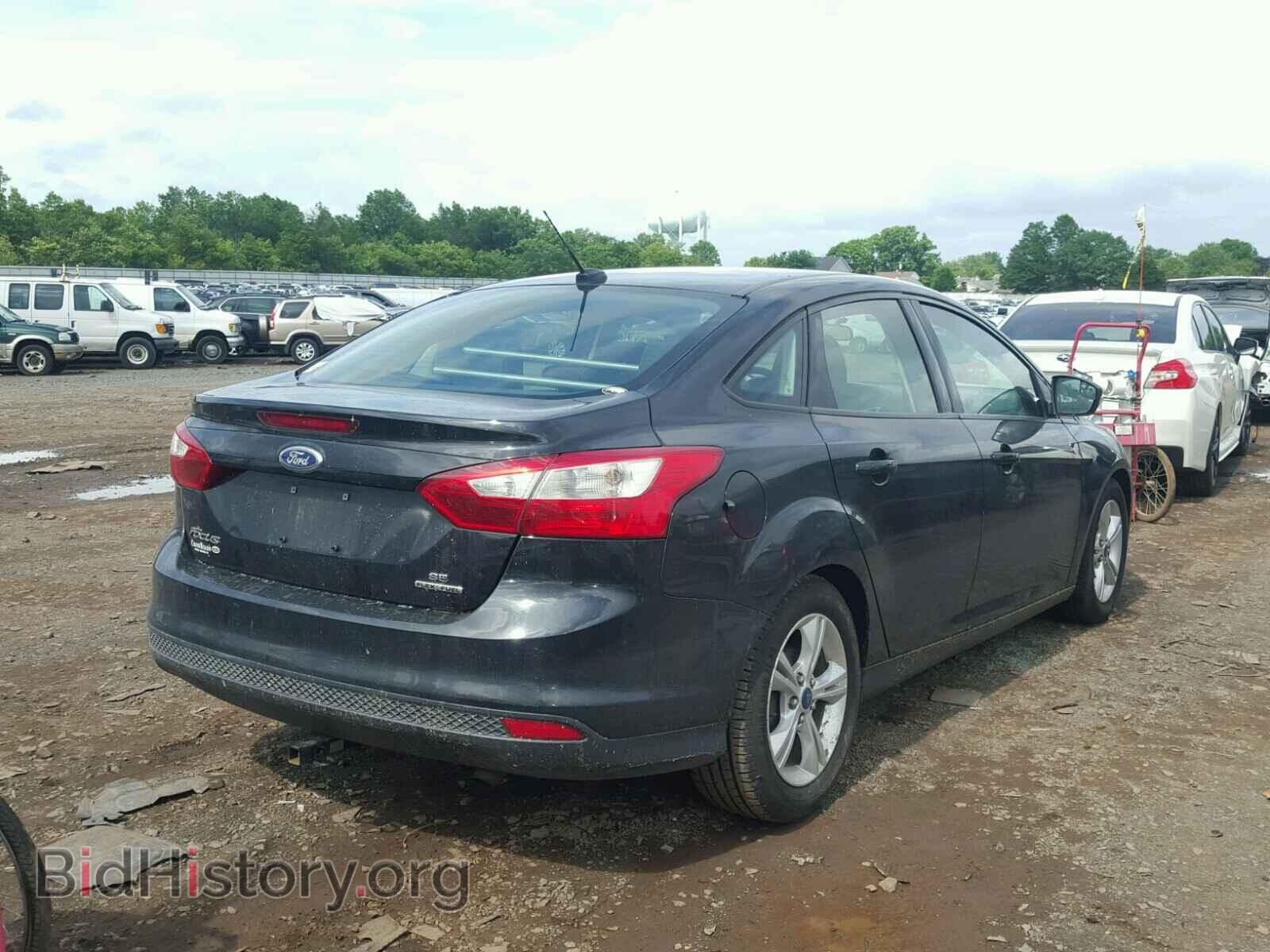 2014 FORD FOCUS - VIN: 1FADP3F28EL107123 - Photo 4