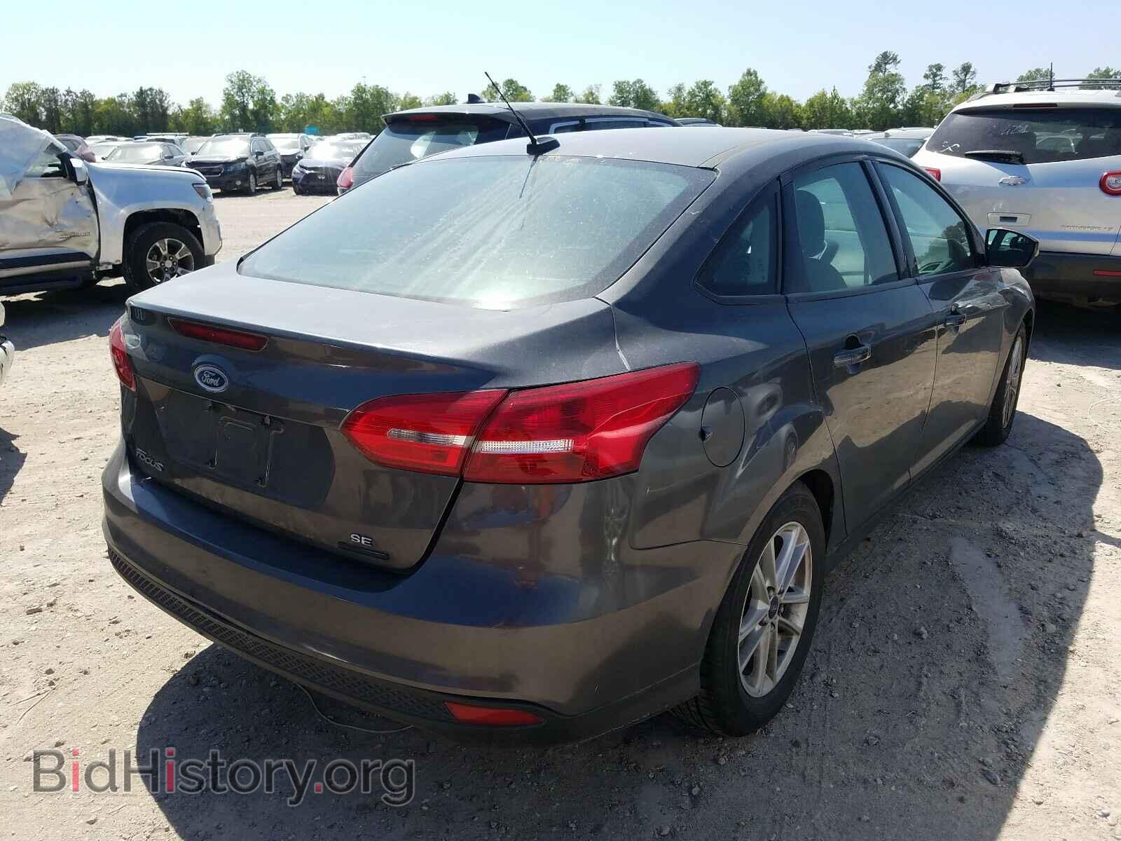 2015 FORD FOCUS - VIN: 1FADP3F21FL206626 - Photo 4