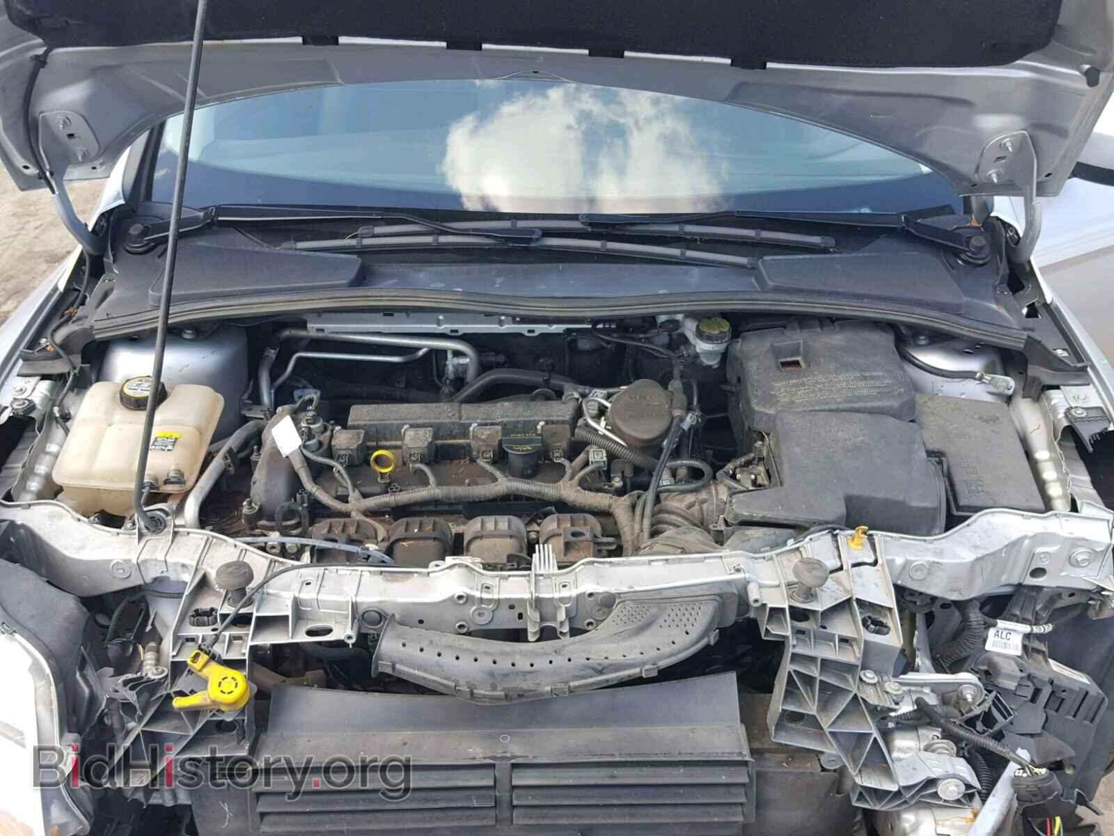 2012 Ford FOCUS (VIN 1FAHP3F20CL260464) — фото 7 из 10