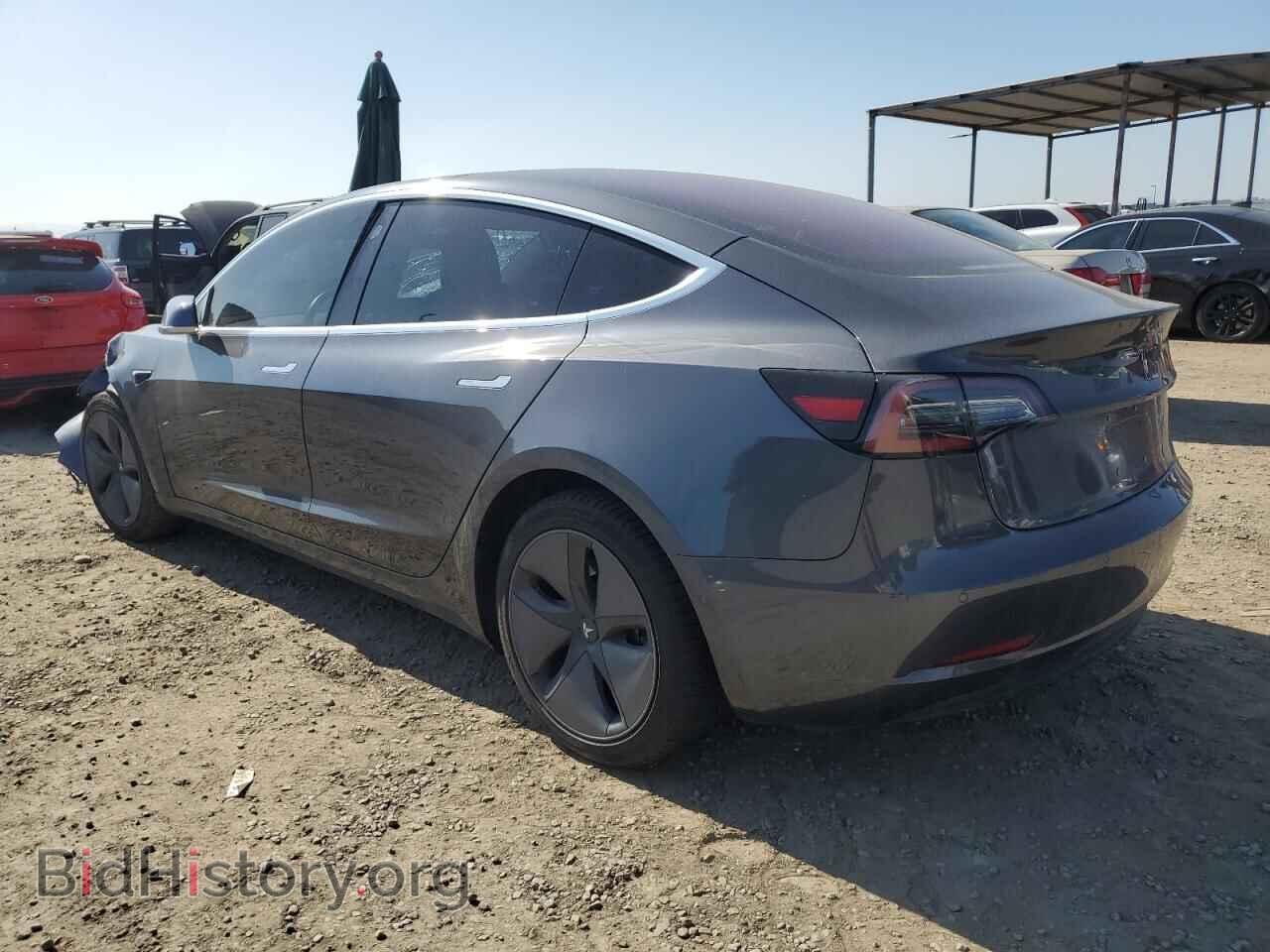 2018 Tesla MODEL 3 (VIN 5YJ3E1EA4JF021474) — photo 2 of 12