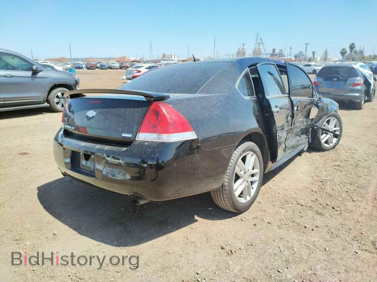 2014 CHEVROLET IMPALA - VIN: 2G1WC5E31E1128334 - Фото 4