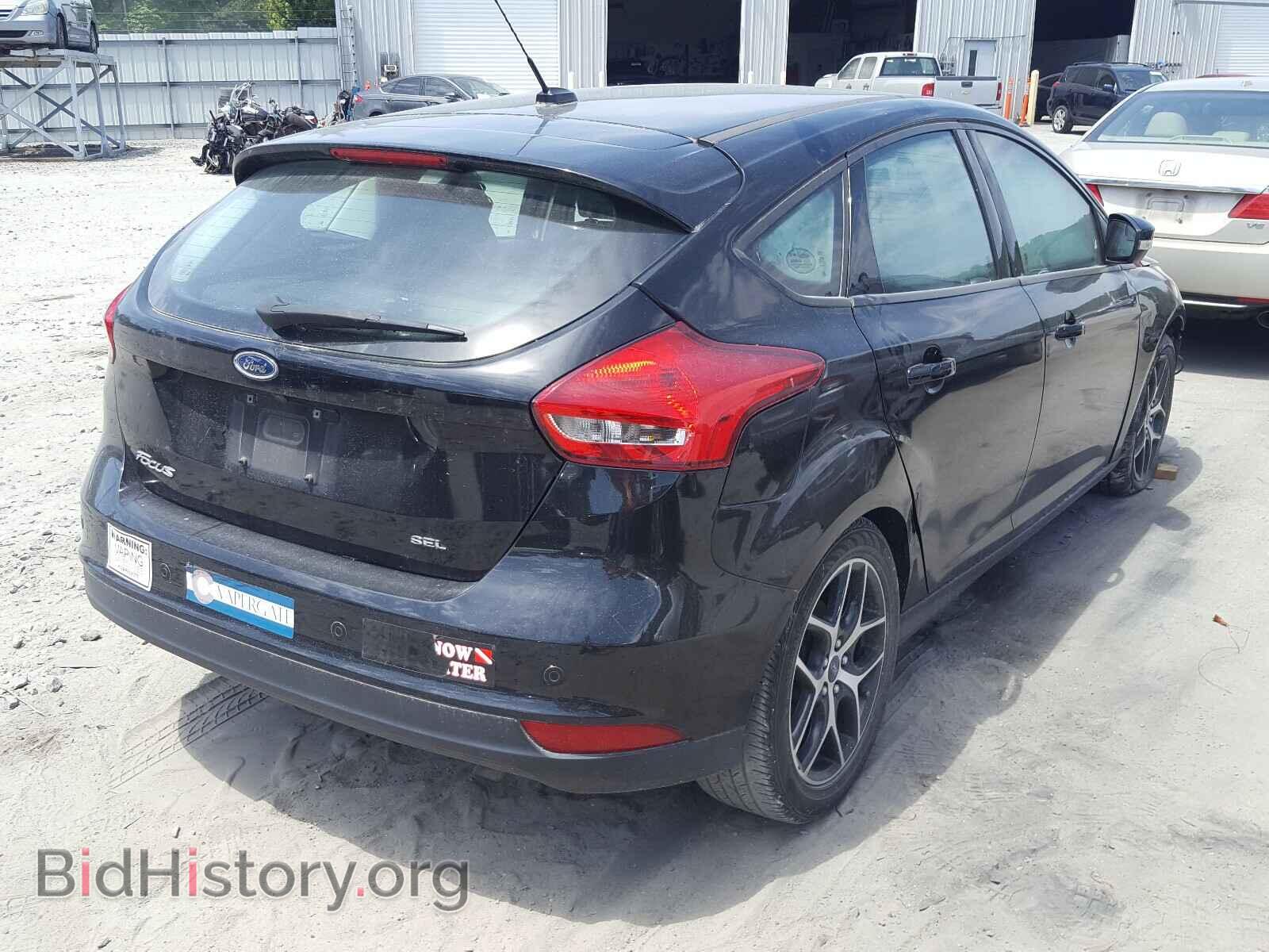 2017 FORD FOCUS - VIN: 1FADP3M26HL311975 - Фото 4