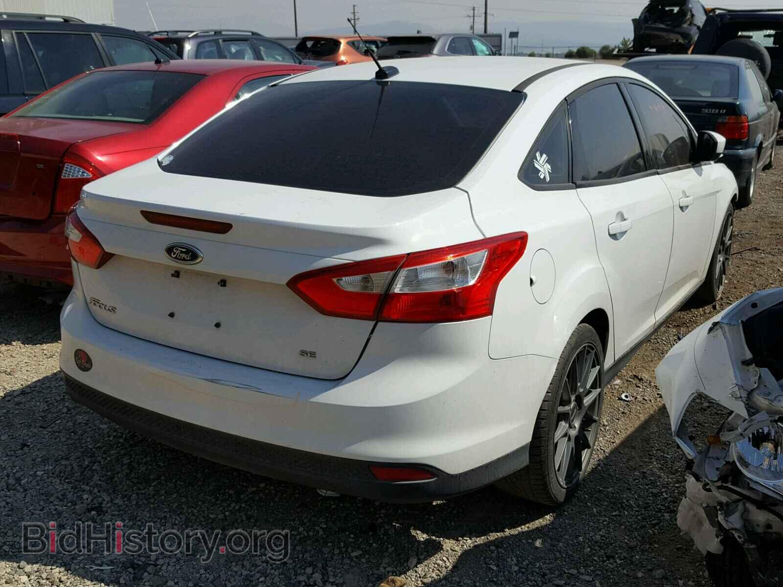 2012 Ford FOCUS (VIN 1FAHP3F25CL106784) — фото 4 из 10