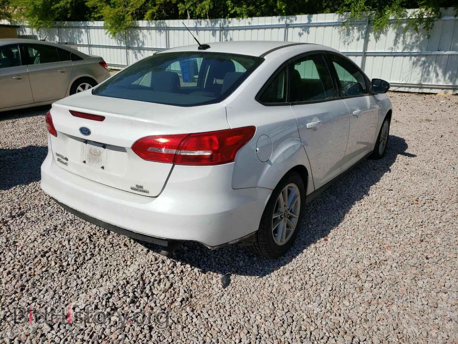2016 FORD FOCUS - VIN: 1FADP3F20GL219210 - Фото 4