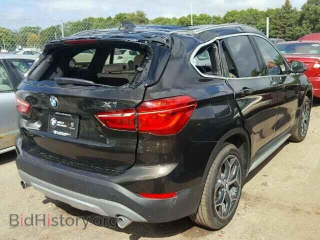 2017 BMW X1 - VIN: WBXHT3C33H5F71679 - Фото 4