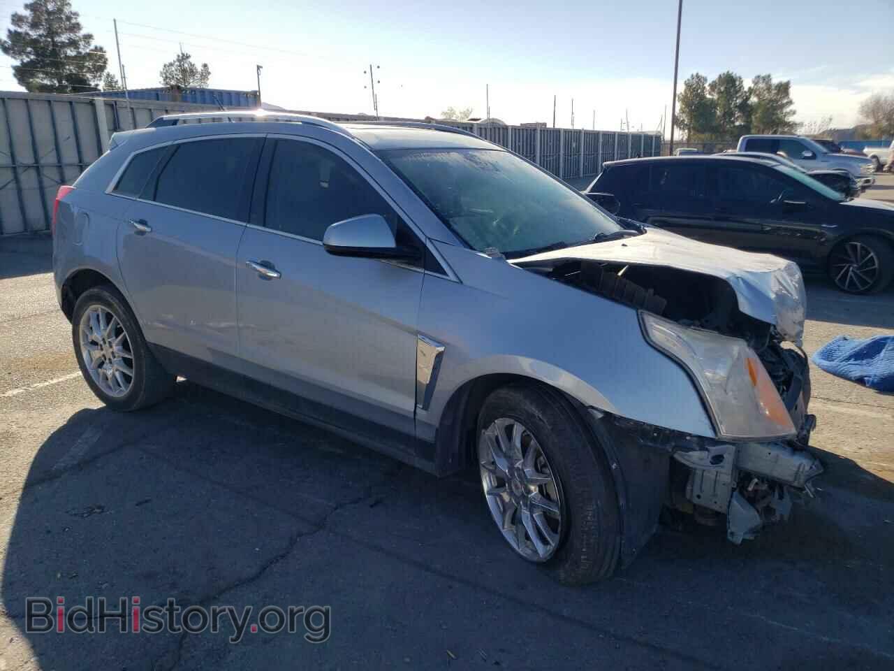 2014 CADILLAC SRX - VIN: 3GYFNDE34ES599114 - Фото 4