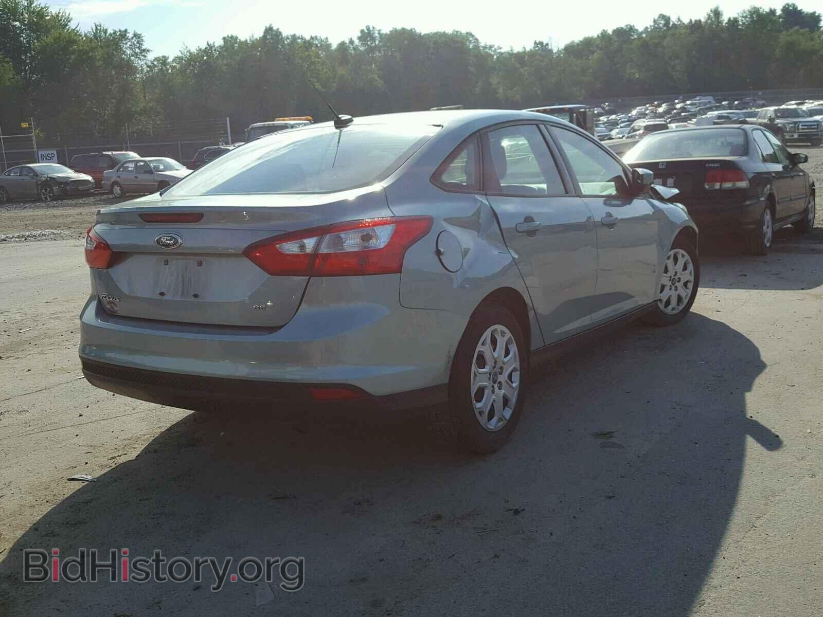 2012 Ford FOCUS (VIN 1FAHP3F28CL307305) — photo 4 of 10
