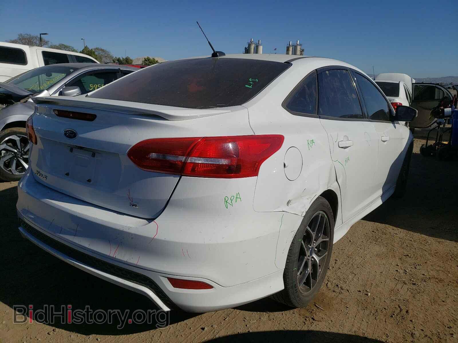 2016 FORD FOCUS - VIN: 1FADP3F2XGL329150 - Фото 4