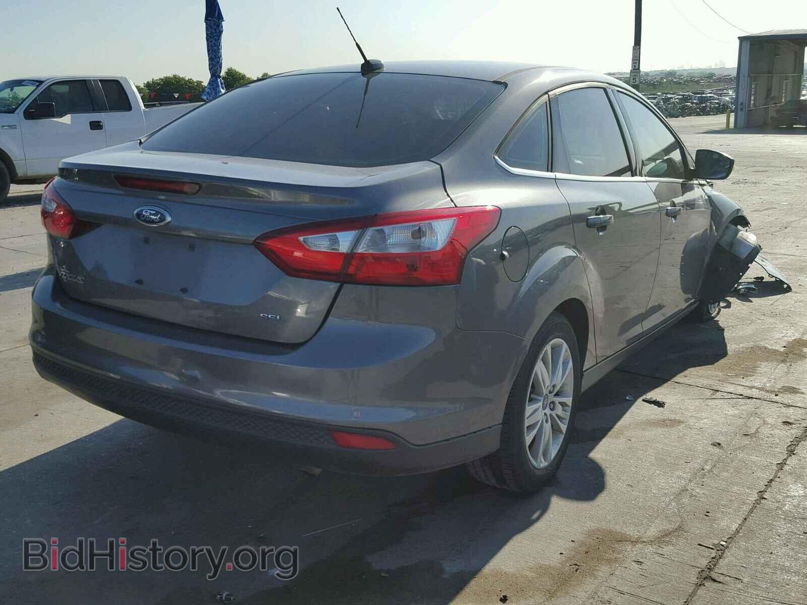 2012 Ford FOCUS (VIN 1FAHP3H21CL161875) — фото 4 из 10