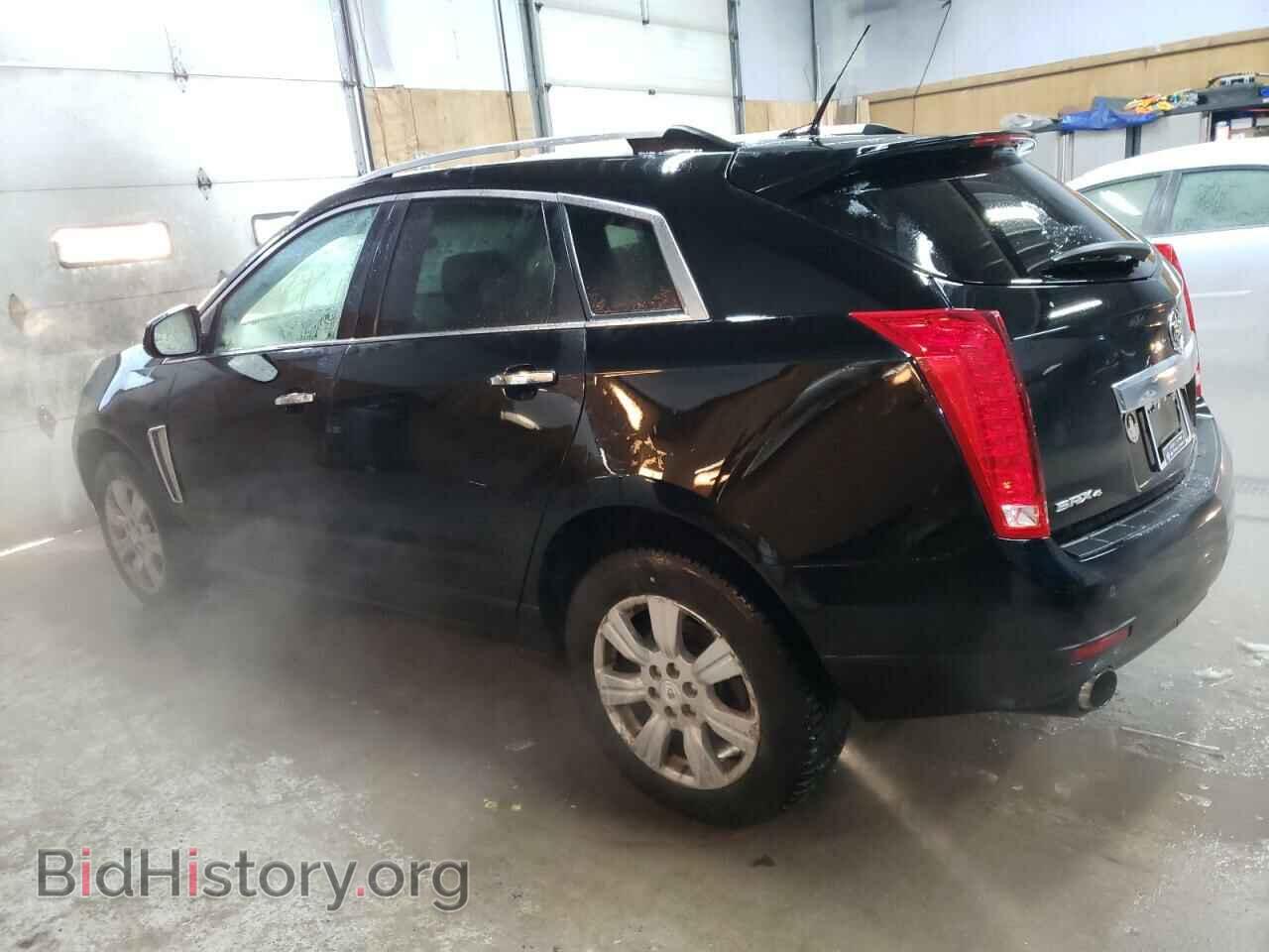 2014 CADILLAC SRX - VIN: 3GYFNEE36ES679276 - Фото 2