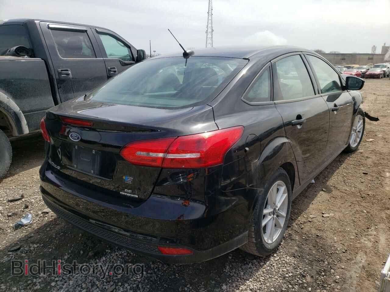 2016 FORD FOCUS - VIN: 1FADP3F20GL379460 - Photo 4