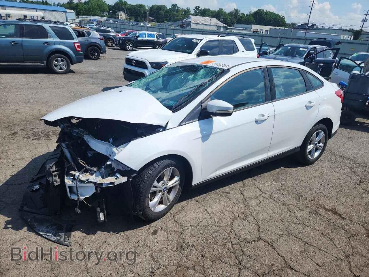 Фотография 1FADP3F29DL368386 - FORD FOCUS 2013