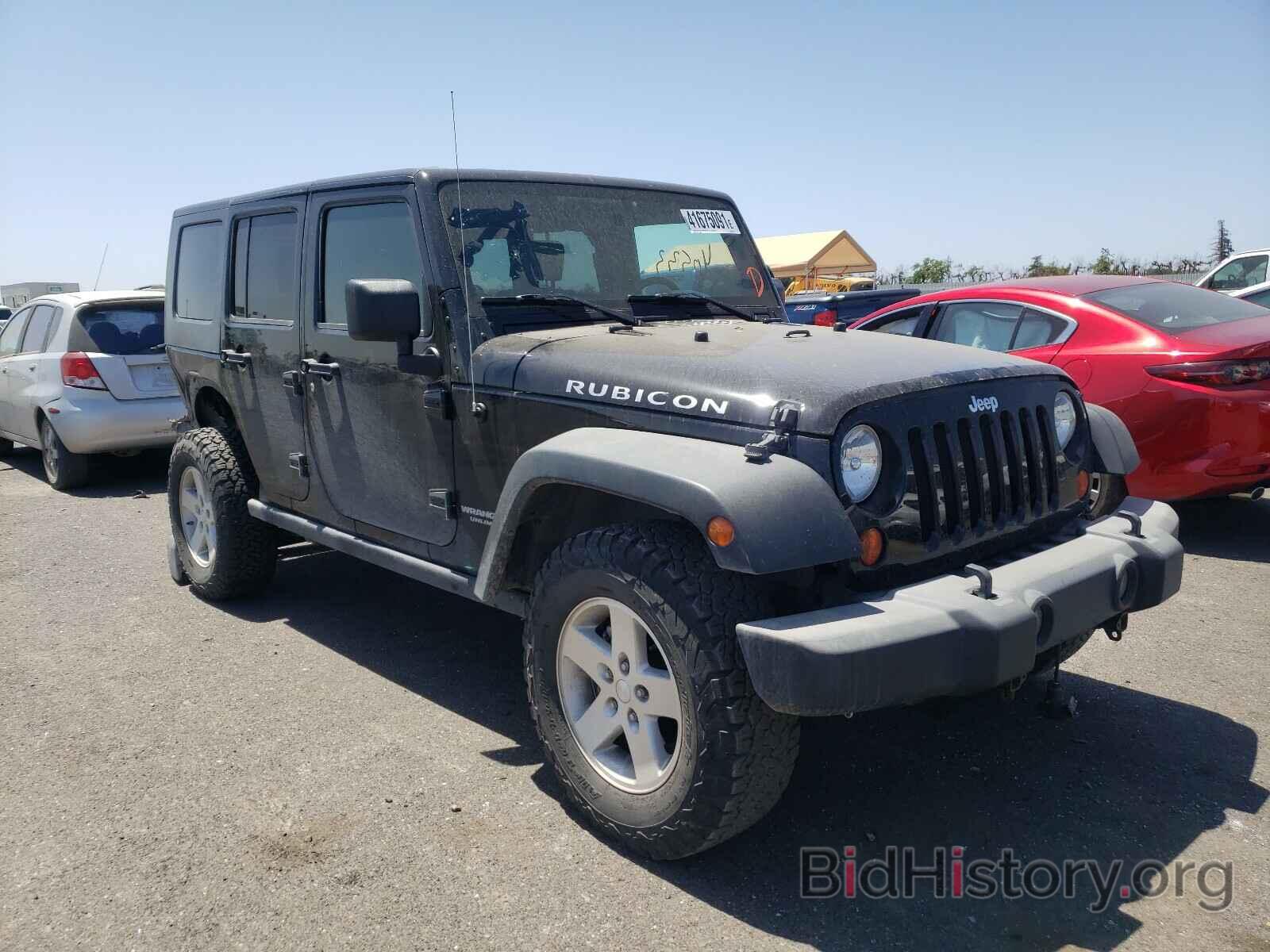 Photo 1J8GA69109L716136 - JEEP WRANGLER 2009