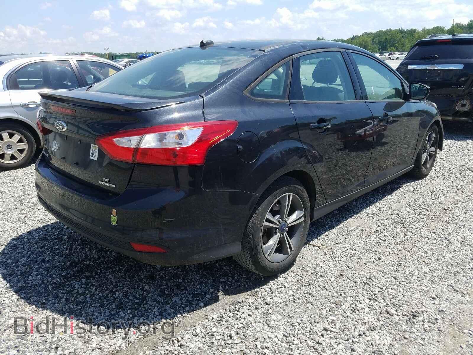 2012 FORD FOCUS - VIN: 1FAHP3F22CL370965 - Photo 4