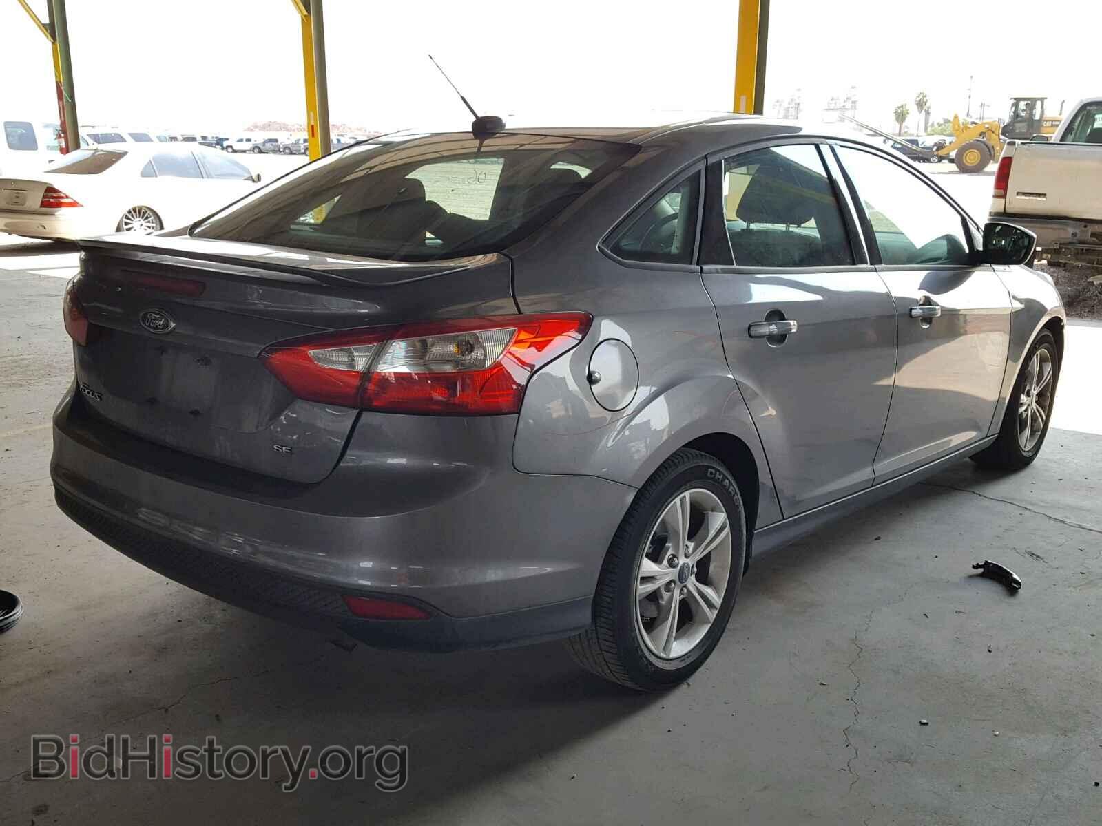 2012 Ford FOCUS (VIN 1FAHP3F25CL403375) — photo 4 of 10