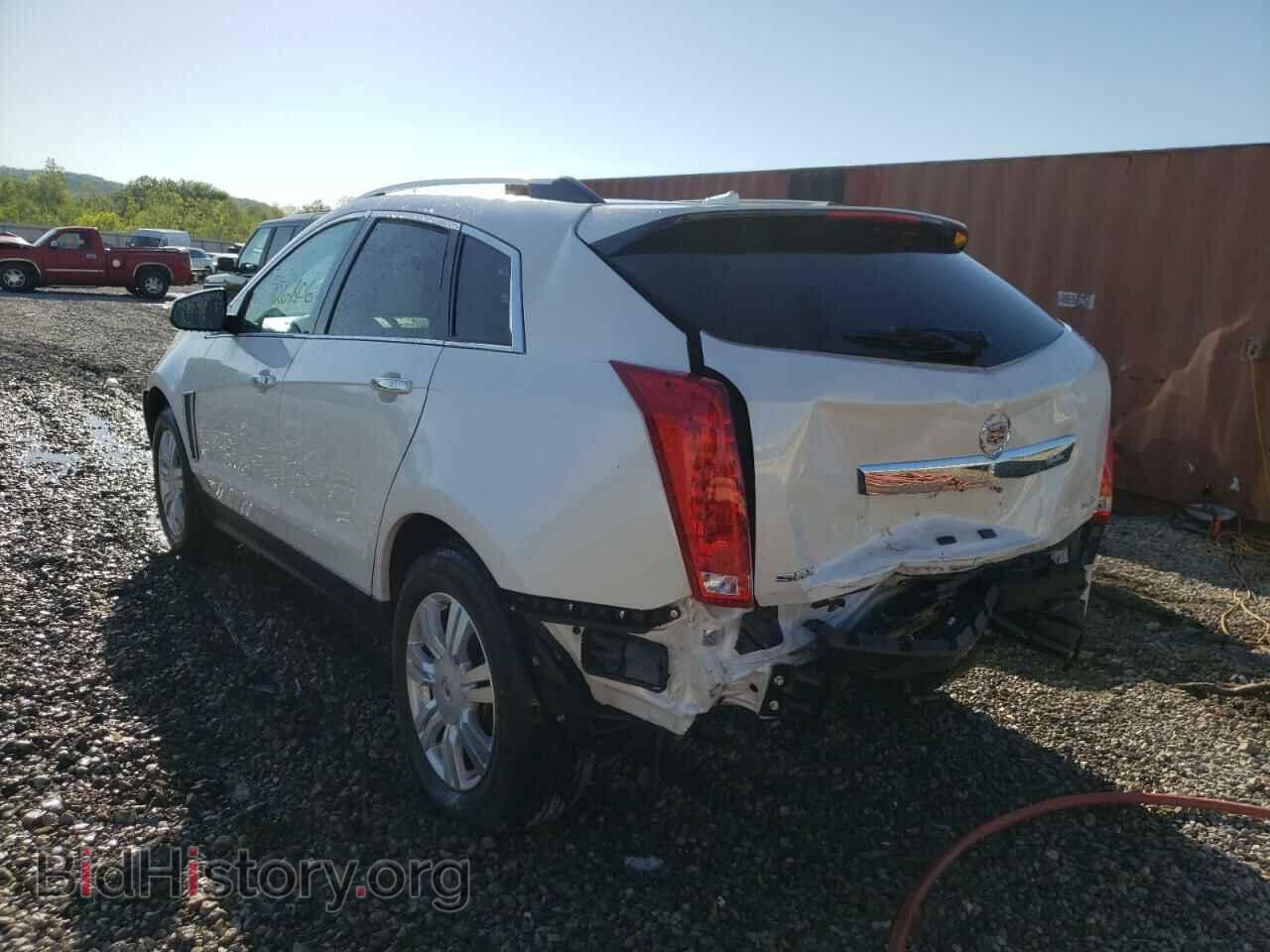 2013 CADILLAC SRX - VIN: 3GYFNCE36DS561490 - Фото 3