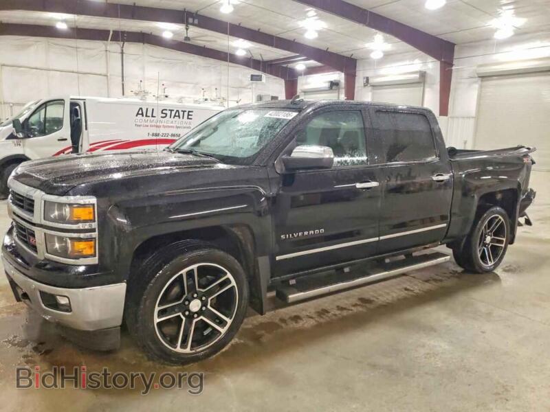 2014 Chevrolet SILVERADO K1500 LTZ (VIN 3GCUKSEC2EG263877) — photo 1 of 12, Copart, damage: side